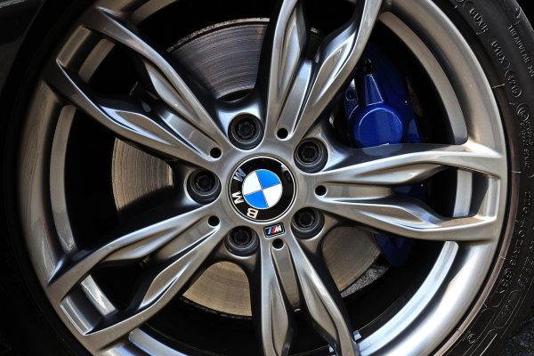 Diamond-cut alloy wheel with a smooth, shiny metallic finish showcasing high-precision craftsmanship, perfect for vehicle enhancement
